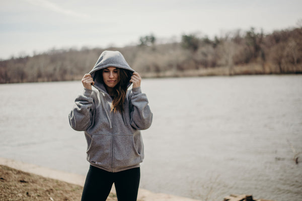 How do I clean my heated clothing?