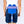 Person wearing a blue gel cold therapy wrap secured around the lower back with a purple elastic strap