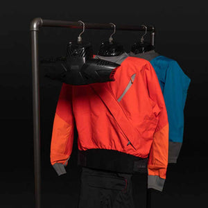 Orange and blue dry tops hanging on a clothing rack