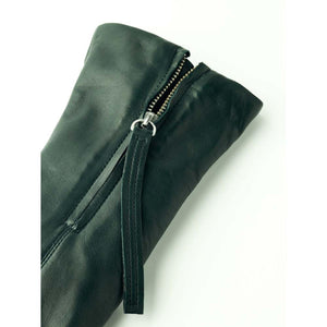 Dark green leather glove detail with silver zipper closure