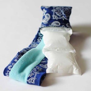 Blue paisley fabric wrap with a white gel ice pack insert