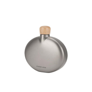 Round titanium flask with a wooden cap