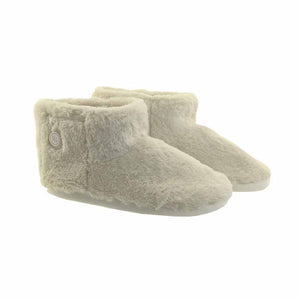 Pair of cream colored faux fur ankle slippers with a small circular logo on the side