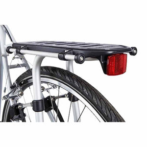 Thule bicycle rear rack with red reflector mounted over a bike wheel