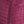 Water droplets on a quilted purple Venture Heat vest