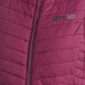 Water droplets on a quilted purple Venture Heat vest
