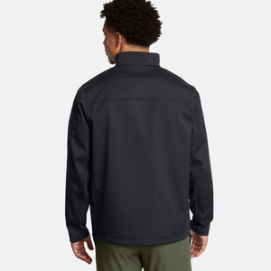 Back view of a person wearing a black Under Armour softshell jacket