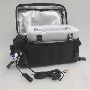 Compcooler portable cooling unit with white plastic case inside black insulated bag with power cables