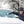 Person using a Zonetech ice scraper to remove ice from a car windshield