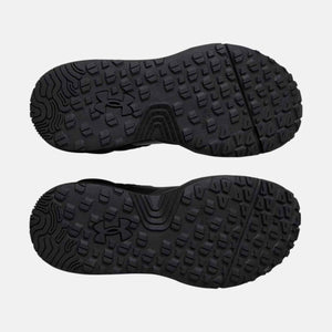 Under Armour black shoe outsoles with slip resistant tread pattern