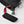 Hestra glove cuff detail with red pull tab and black cord lock