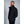 Man wearing a black 8K FlexWarm puffer jacket