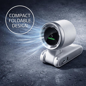 White portable handheld fan with digital display showing speed setting and battery level