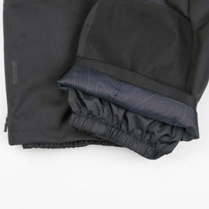Black ski pant cuff with Recco logo and internal elastic snow gaiter