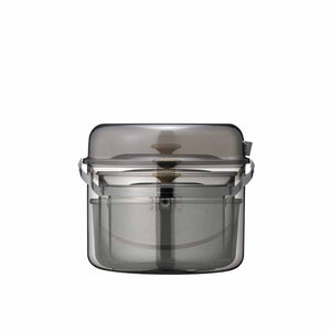 Snow Peak Field Cooker Pro 1 set with nested stainless steel pots and mesh basket in a translucent grey storage case