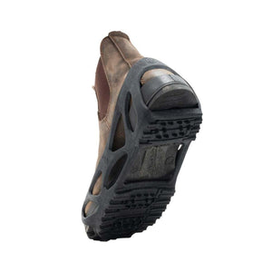 Blundstone boot with black rubber ice traction cleats attached to the sole