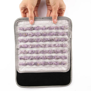HealthyLine amethyst stone therapy pad held by hands