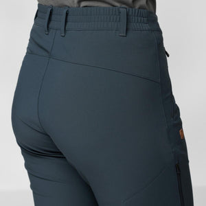Rear view of dark blue FjallRaven trousers with elastic waistband and belt loops