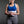 ThermApparel white cooling vest worn over a blue sports bra