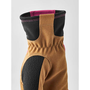 Tan suede and black fabric glove cuff with pink trim