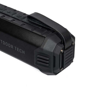 Outdoor Tech black portable speaker with carry strap and control buttons