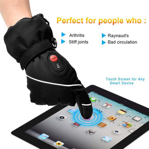 Black heated glove with power button touching a tablet screen
