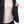 Close up of black jacket interior showing zipper pocket and textured lining