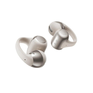 Beige wireless open ear earbuds with metallic accents