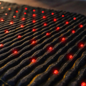 HealthyLine mat surface with rows of glowing red LED lights