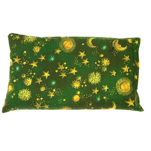 Heaven's Therapy rectangular eye pillow with green fabric featuring yellow suns moons and stars