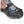 Hand tightening a Hillsound traction device strap over a hiking boot