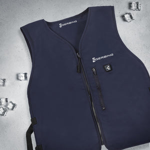 Navy blue Gerbing heated vest with front zipper and chest pocket on a grey background with ice cubes