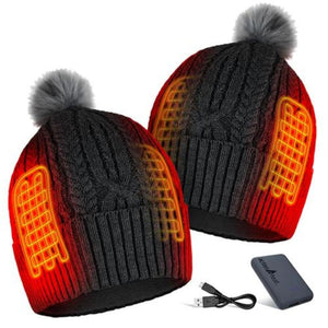 ActionHeat grey cable knit beanie with pom pom and internal heating elements shown with battery pack and USB cable