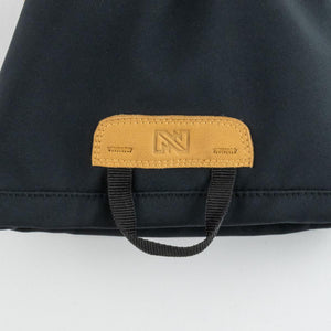 Mobile Warming black fabric with tan leather logo patch and black pull tab