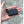 Volt Heat rechargeable battery pack with attached power connector held in palm