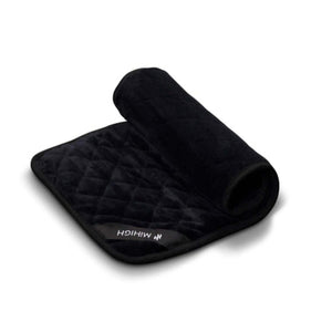 Black quilted MiHIGH towel folded on a white background