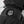 Black Hestra glove with branded rubber patch and metal carabiner