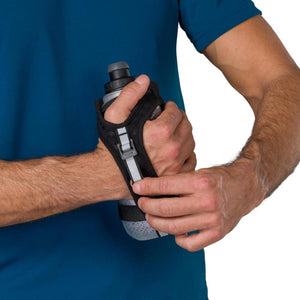 Person wearing a black handheld running water bottle strap