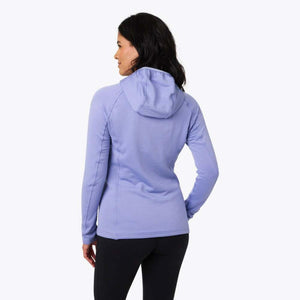 Back view of a woman wearing a light purple long sleeve hooded fleece jacket with black leggings