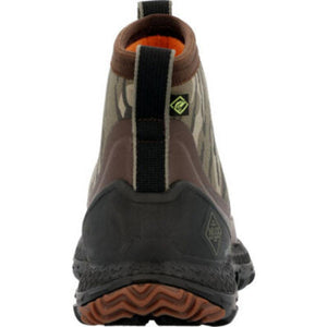 Rear view of Muck camouflage ankle boot with black rubber heel and orange interior lining