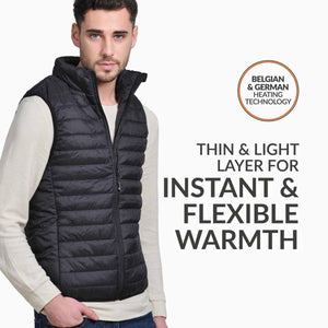 Man wearing a black quilted vest featuring Belgian and German heating technology
