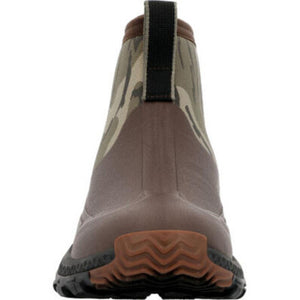 Back view of a brown and camouflage ankle boot with a black pull tab and textured rubber sole