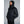 Man wearing a black 8K FlexWarm hooded puffer jacket