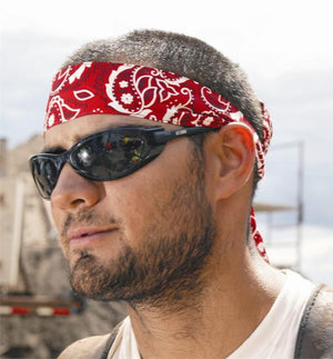Man wearing a red paisley Chill-Its cooling bandana and black sunglasses