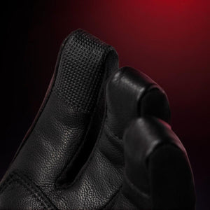 Close up of black leather glove fingertips with textured grip detail