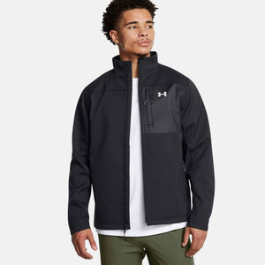 Man wearing a black Under Armour zip up jacket with a chest pocket