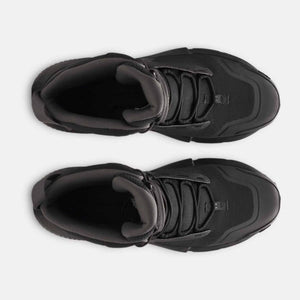 Top view of black Under Armour athletic sneakers