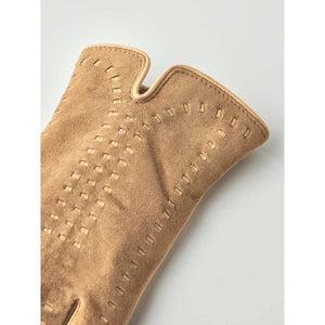 Tan suede gloves with decorative whipstitch detailing on the back