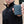 Person holding a grey ActionHeat power bank