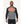 Man wearing a grey and black long sleeve compression shirt with orange grid pattern on chest and cuffs